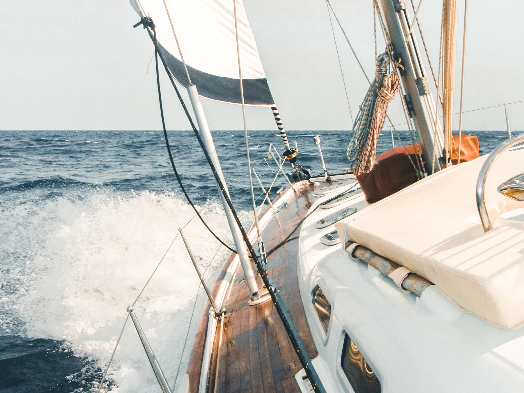 Motorboat steering on the sea at daytime