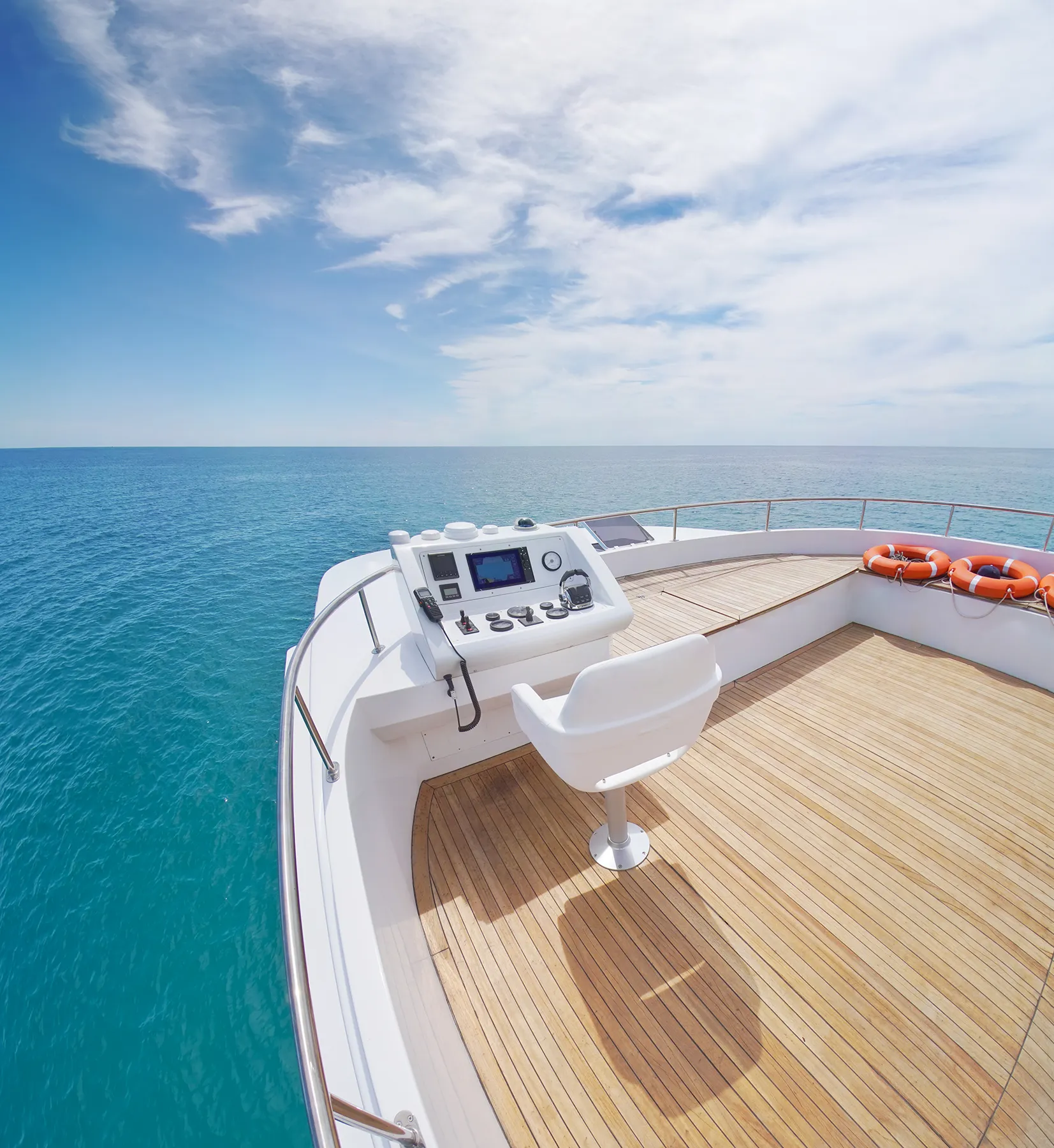 View from yacht flybridge open deck on the calm sea water at day