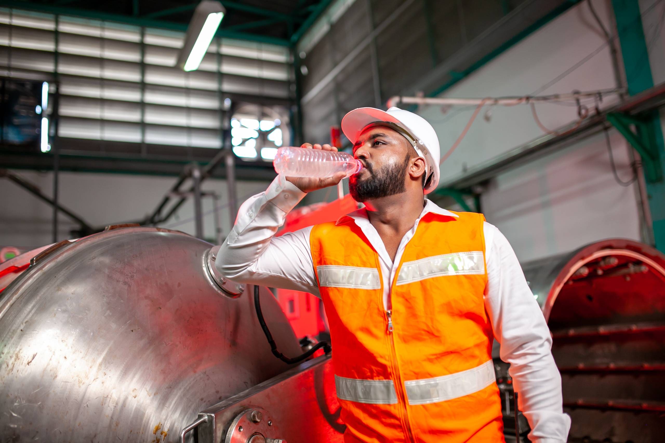 A water desalination specialist drink freshly made water from an Echo Tec watermaker.